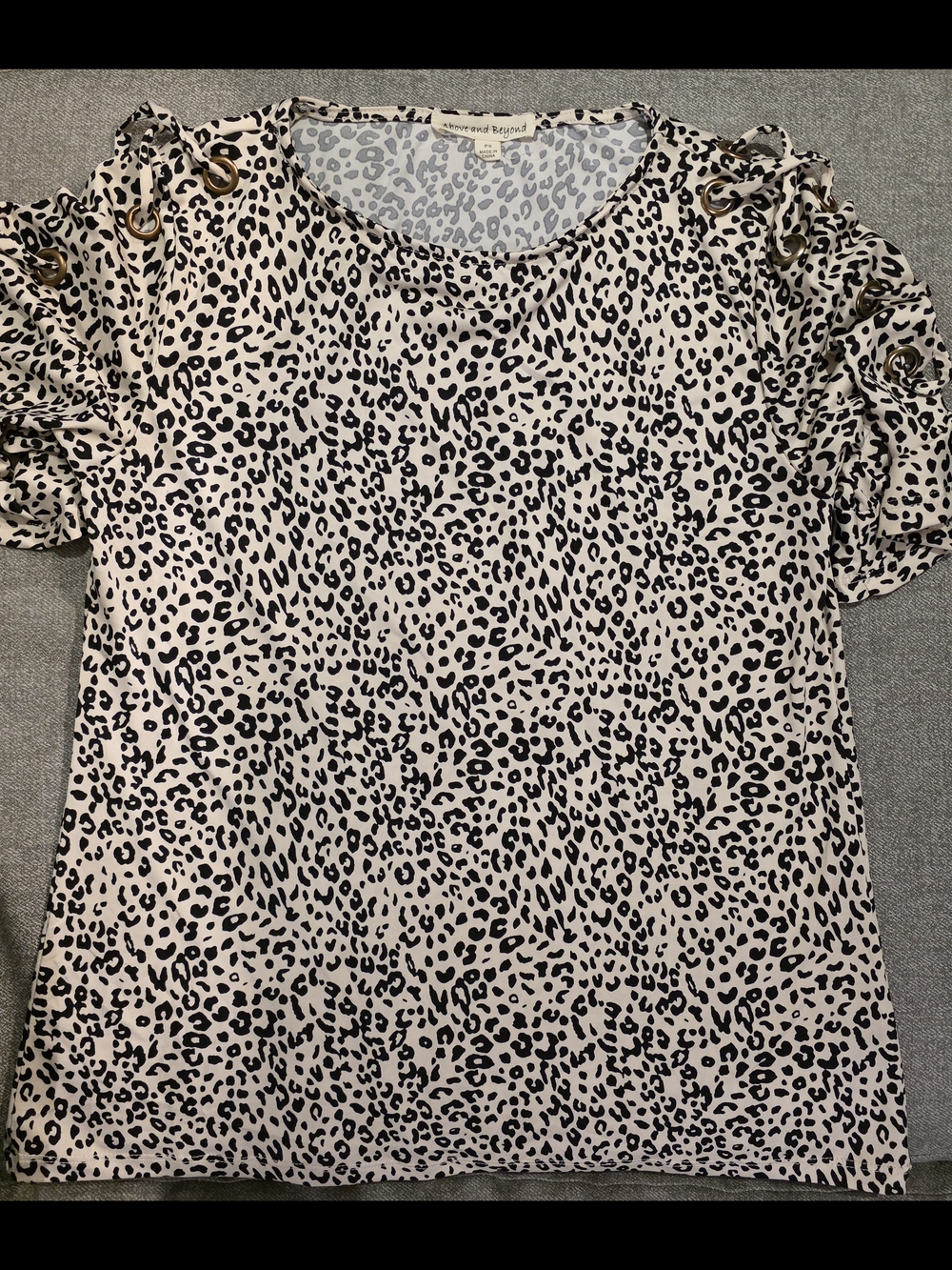 Above And Beyond Leopard Print Short Sleeve Top with Grommet Detail -Cream/Black